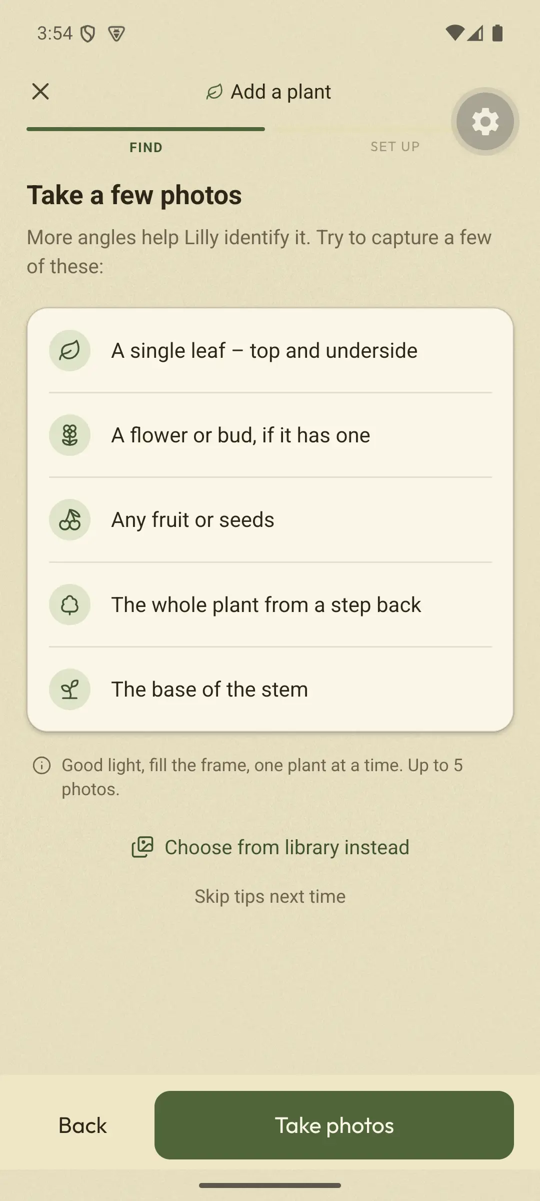 Real beta screen, from when the app was called Lilly. Take a few photos. More angles help Lilly identify it, with a list: a single leaf, a flower or bud, any fruit or seeds, the whole plant, the base of the stem.